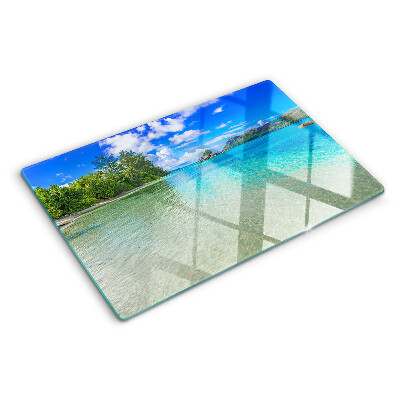 Glas-Schneidebrett mit Motiv eines tropischen Strandes und azurblauem Wasser