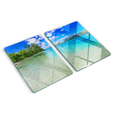 Glas schneidebrett Tropischer Strand mit azurblauem Wasser
