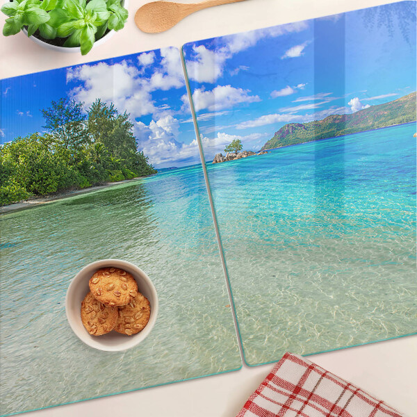 Glas schneidebrett Tropischer Strand mit azurblauem Wasser