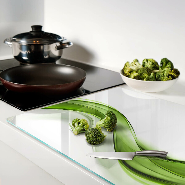 Schneidebrett Glas mit grünem abstraktem Wellenmuster