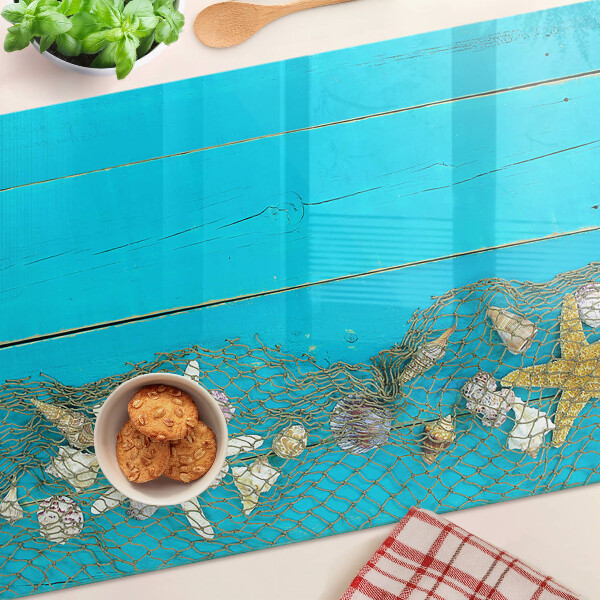 Schneidebrett Muscheln und Seesterne in einem Netz