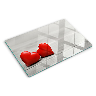 Schneidebrett Rote Herzen auf Holzgrund