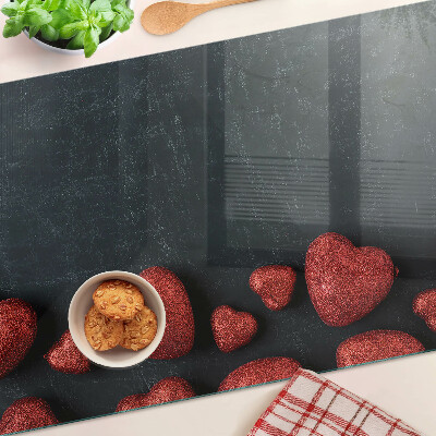 Schneidebrett glas Rote Herzen auf dunklem Hintergrund