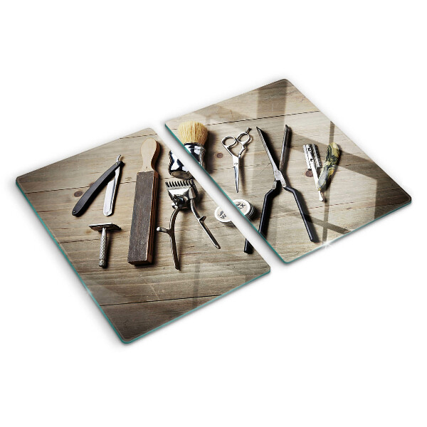 Glas schneidebrett Friseurwerkzeuge auf Holzgrund