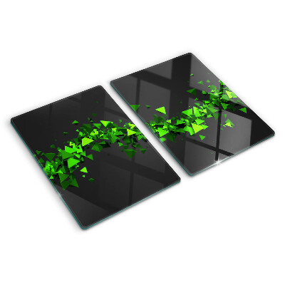 Schneidebrett mit grünem Dreiecksmuster auf schwarzem Hintergrund