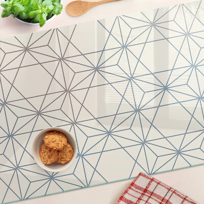 Glas-Schneidebrett mit geometrischem Muster aus Dreiecken und Linien