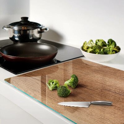 Glas-Schneidebrett mit Holzoptik und Fensterspiegelung