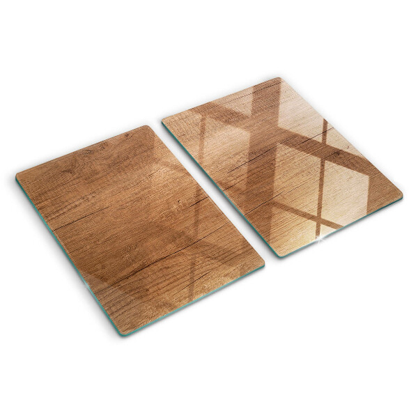 Glas-Schneidebrett mit Holzoptik und Fensterspiegelung