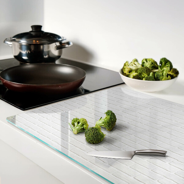 Schneidebrett aus Glas mit Ziegelmauer-Motiv