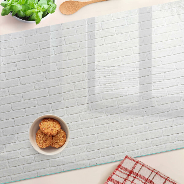 Schneidebrett aus Glas mit Ziegelmauer-Motiv