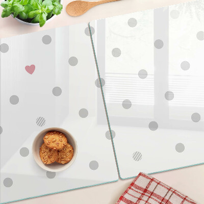 Schneidebrett mit Punkten und einem Herzmotiv