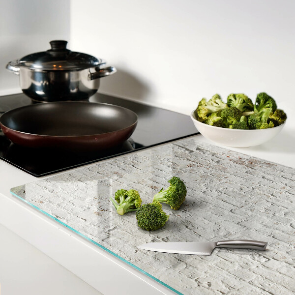 Schneidebrett Glas mit Motiv einer Backsteinwand im Loft-Stil