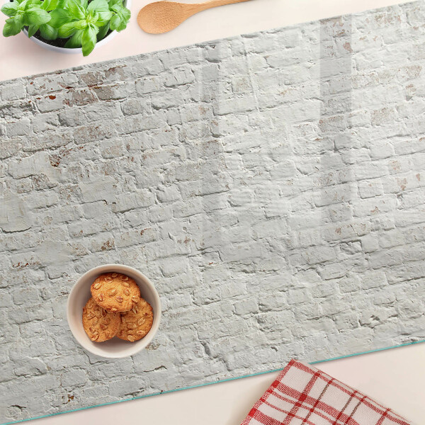 Schneidebrett Glas mit Motiv einer Backsteinwand im Loft-Stil