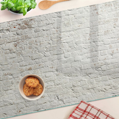 Schneidebrett Glas mit Motiv einer Backsteinwand im Loft-Stil
