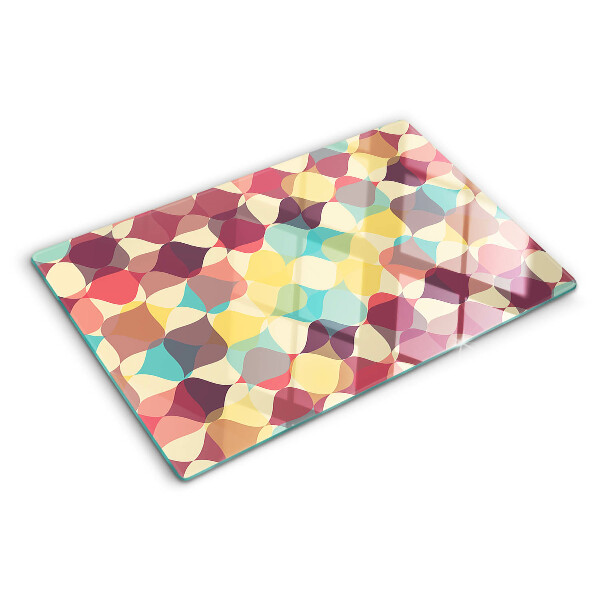 Schneidebrett mit einem geometrischen Muster aus farbigen Kreisen