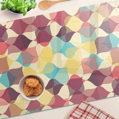 Schneidebrett mit einem geometrischen Muster aus farbigen Kreisen