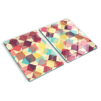 Schneidebrett mit einem geometrischen Muster aus farbigen Kreisen