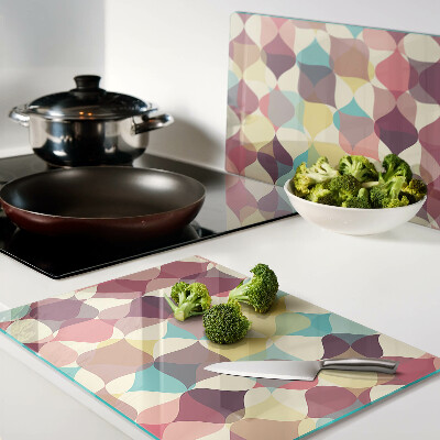 Schneidebrett mit einem geometrischen Muster aus farbigen Kreisen