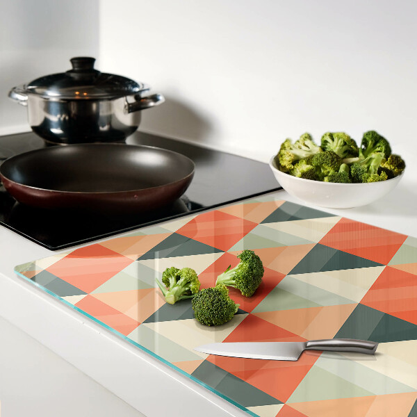 Schneidebrett Glas mit Dreiecken in Orangetönen