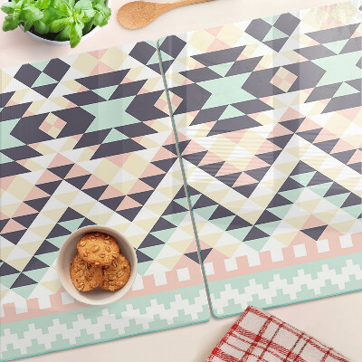 Schneidebrett mit geometrischem Motiv in Pastellfarben