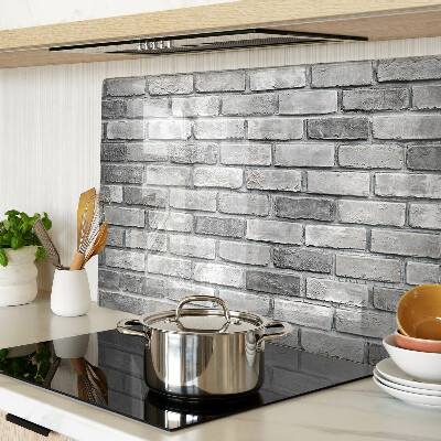 Schneidebrett Backsteinmauer in Grautönen