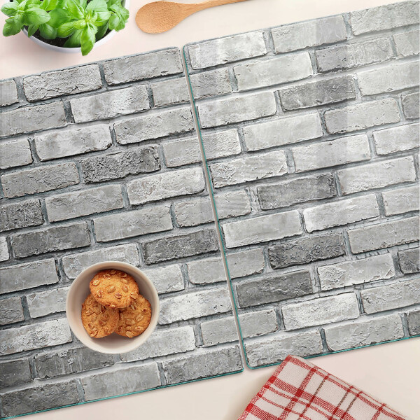 Schneidebrett Backsteinmauer in Grautönen