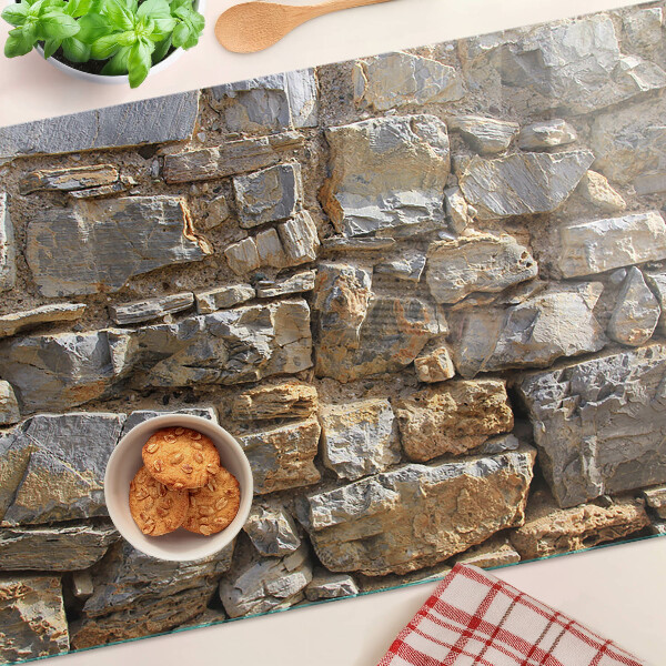 Glas-Schneidebrett mit Motiv einer Steinmauer