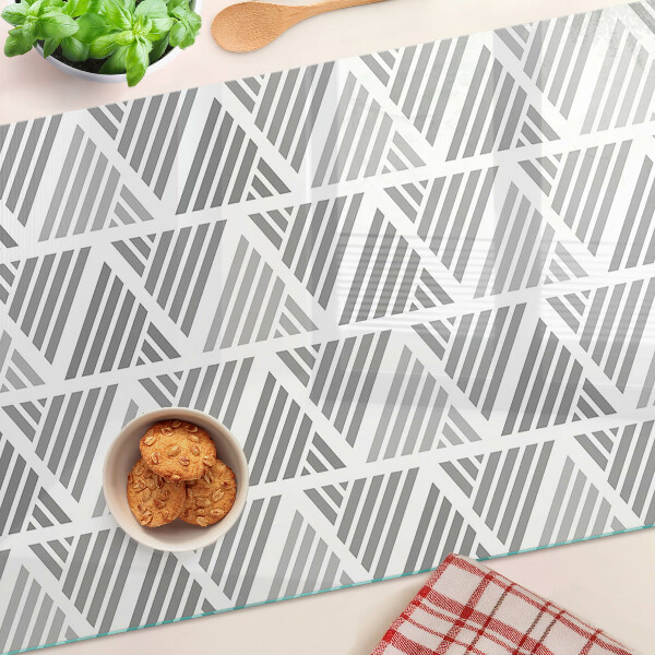 Schneidebrett mit geometrischem Muster in Grautönen