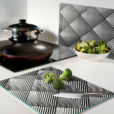 Glas-Schneidebrett mit schwarz-weißem geometrischem Motiv