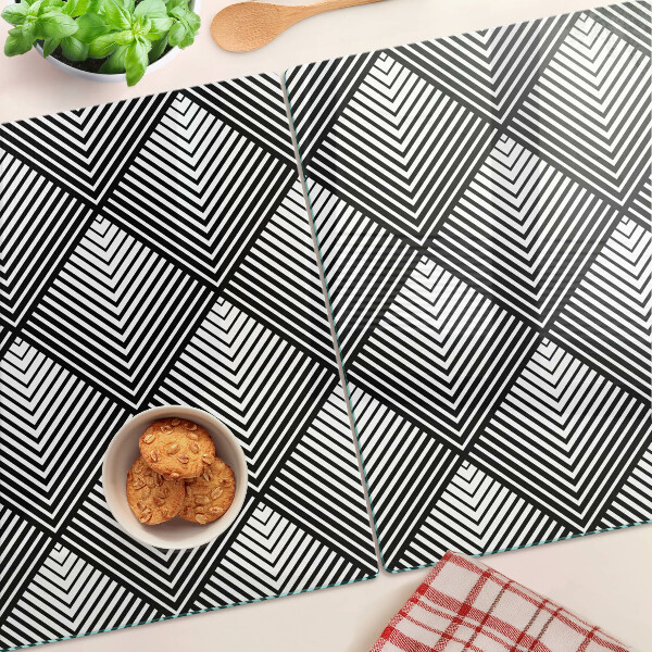 Glas-Schneidebrett mit schwarz-weißem geometrischem Motiv