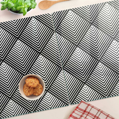 Glas-Schneidebrett mit schwarz-weißem geometrischem Motiv