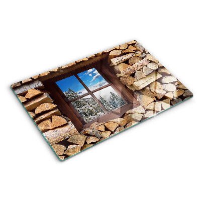 Glas schneidebrett Blick durch das Fenster auf eine Winterlandschaft