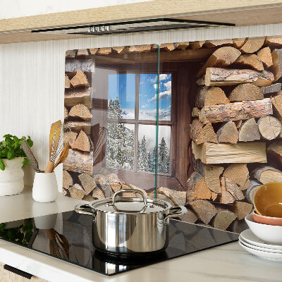 Glas-Schneidebrett mit Motiv einer Winterlandschaft, sichtbar durch ein Fenster