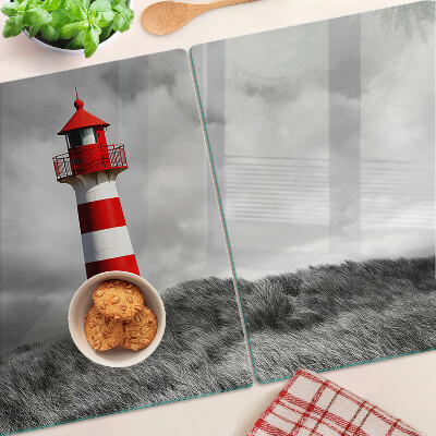 Schneidebrett Ein Leuchtturm in der Landschaft