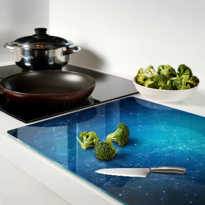 Glas-Schneidebrett mit einem Muster aus geometrischen Linien und Punkten