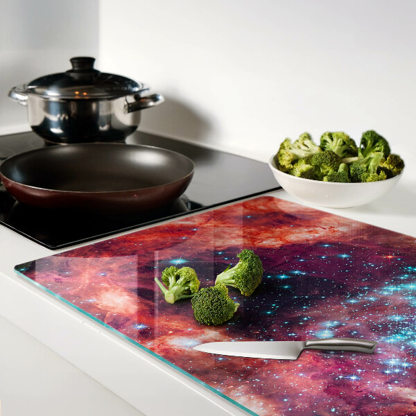 Schneidebrett mit Motiv einer kosmischen Landschaft und Sternen