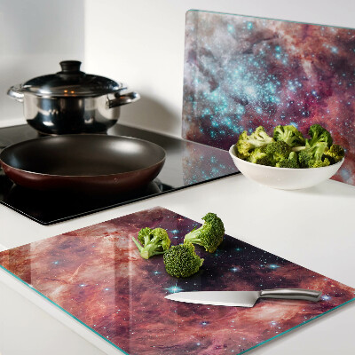 Schneidebrett mit Motiv einer kosmischen Landschaft und Sternen