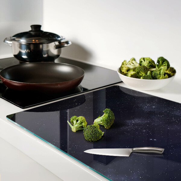 Schneidebrett Glas mit kosmischem Universum-Design und Sternmotiv