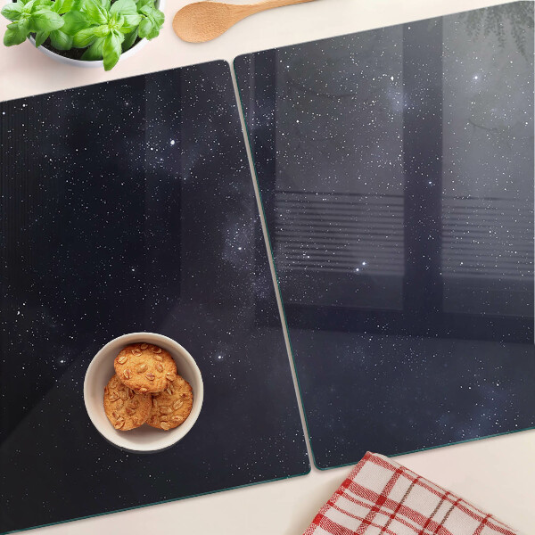 Schneidebrett Glas mit kosmischem Universum-Design und Sternmotiv
