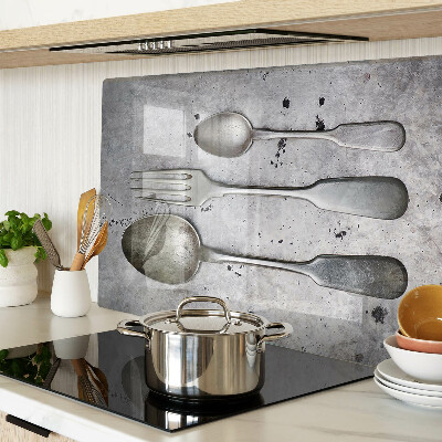 Schneidebrett Glas mit Besteckmotiv auf Betongrund