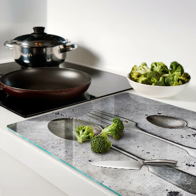 Schneidebrett Glas mit Besteckmotiv auf Betongrund