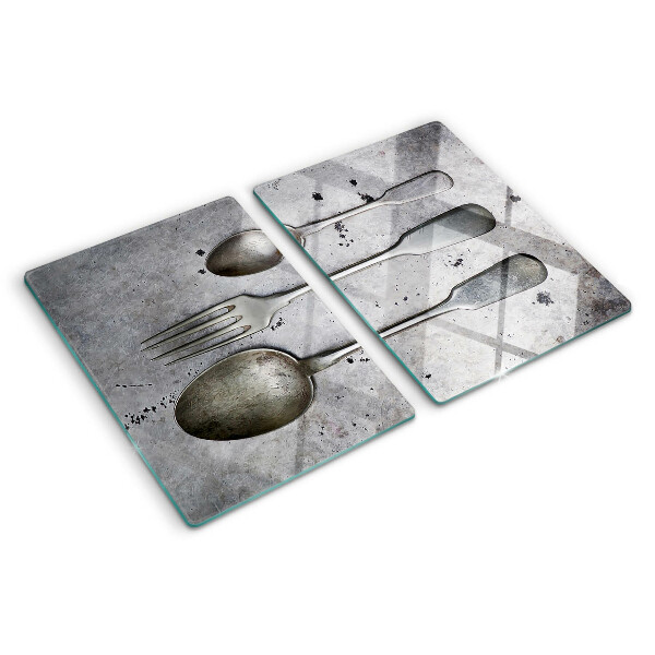 Schneidebrett Glas mit Besteckmotiv auf Betongrund