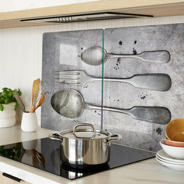 Schneidebrett Glas mit Besteckmotiv auf Betongrund