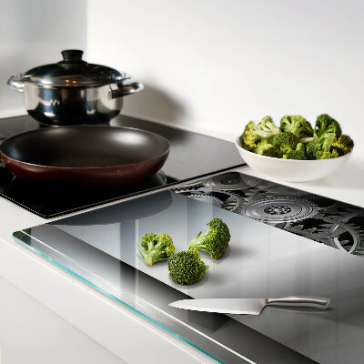 Schneidebrett mit Motiv aus mechanischen Zahnrädern und metallischer Oberfläche