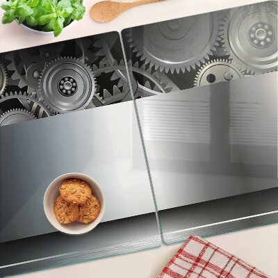 Schneidebrett mit Motiv aus mechanischen Zahnrädern und metallischer Oberfläche