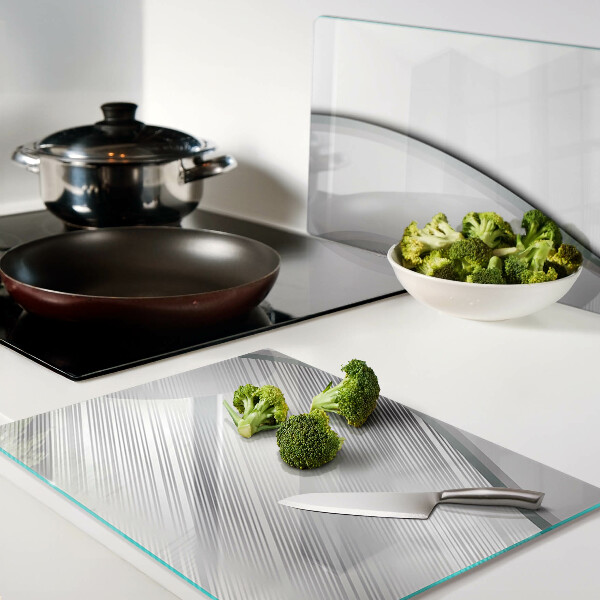 Glas-Schneidebrett mit abstraktem Wellenmuster