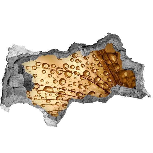 3D Wandtattoos Mauerdurchbruch Ein goldener Tropfen auf dem Betonhintergrund