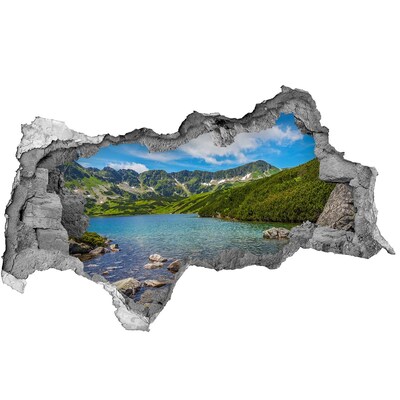 Wandbilder 3D Mauerdurchbruch Ein von Grün umgebener Bergsee