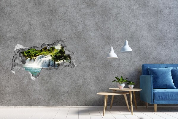 Mauerdurchbruch Aufkleber Ein Wasserfall inmitten des Grüns