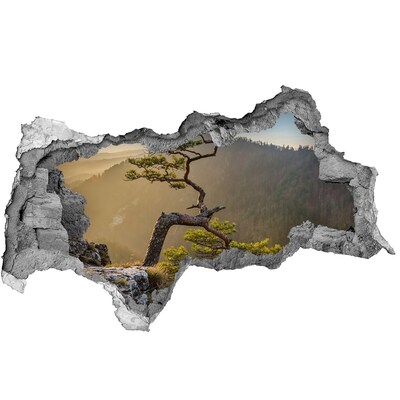 Wandtattoos Mauerdurchbruch Berglandschaft mit einem Baum